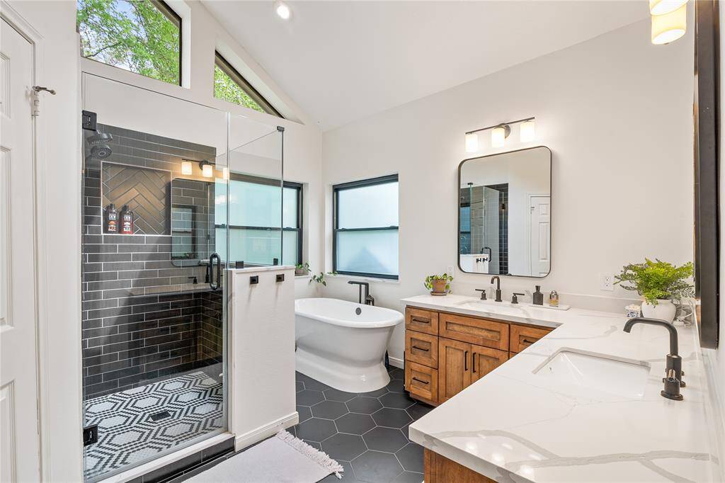 The primary bathroom has extra large shower, soaking tub and dual vanities.