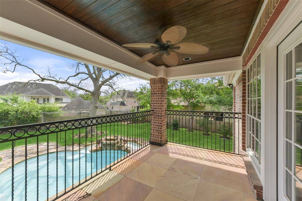 Access the balcony through the media room for 180-degree views of paradise.