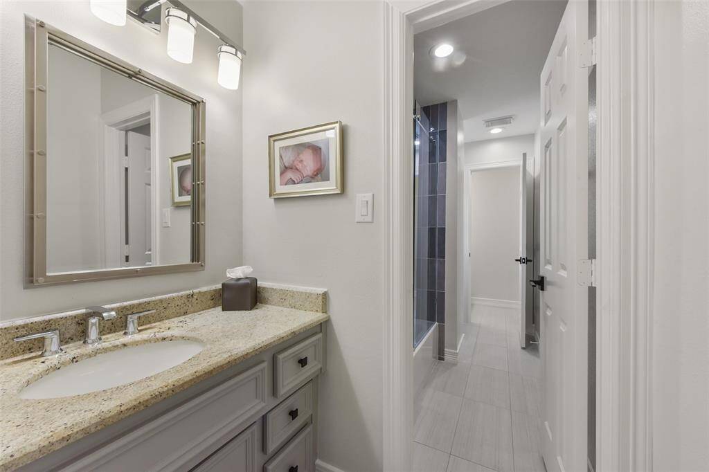 Hollywood style bathroom located upstairs.