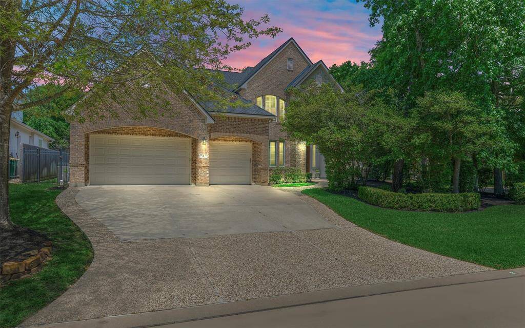 Sprawling 5 bedroom custom home on oversized corner lot with a TRUE 3-car garage!