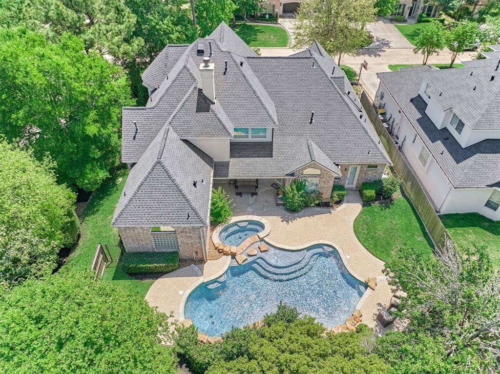 Wow! Privacy and relaxation abound on this oversized corner lot that boasts a 2021 roof!