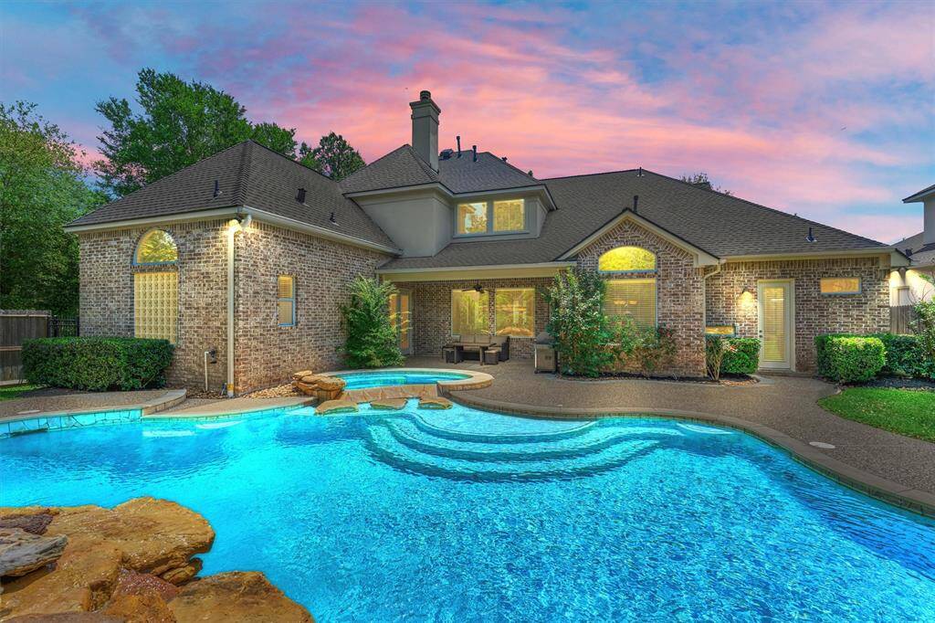 This photo speaks for itself! Relax and unwind in your private backyard oasis with stunning pool & spa.