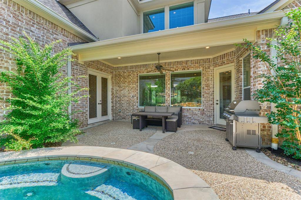 Take a break from the sun underneath the covered back patio with fan. Bring your outdoor furniture and grills!