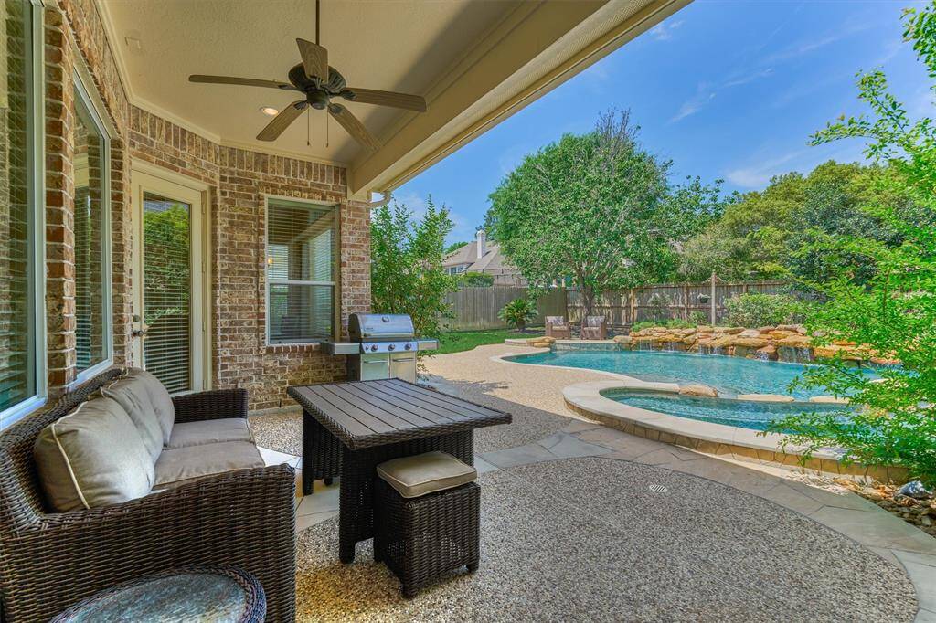 Entertaining and relaxation will come easy under this covered patio with unmatched views of the sparkling pool & spa!