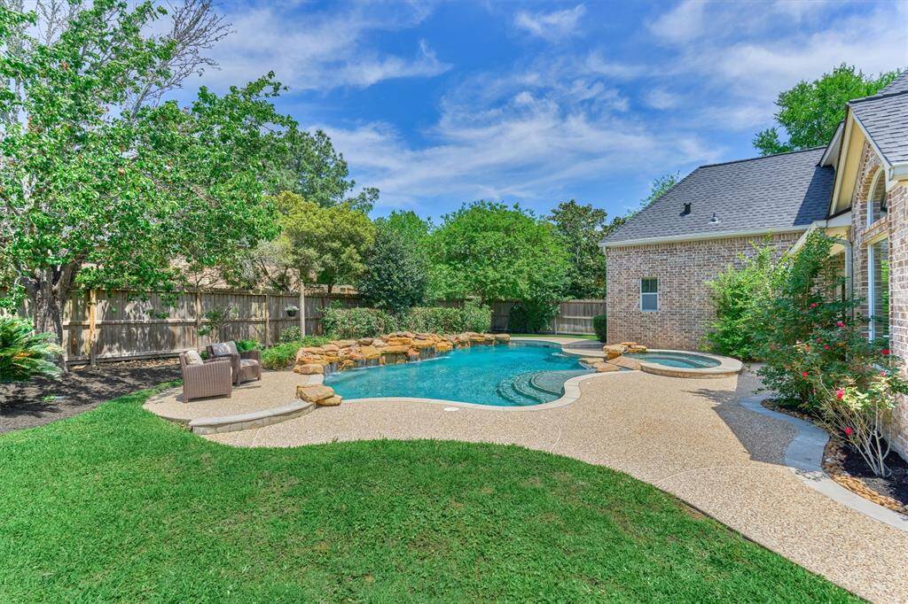 This private backyard oasis us one-of-a-kind! Note: tons of green space for kids and pets to play.