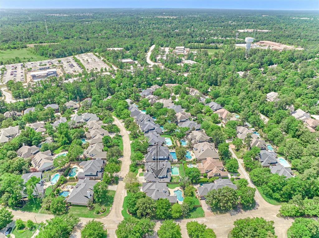 Coveted corner lot with tree-lined buffer on one side (no neighbor)! Walk/ride to nearby YMCA, library, TWHS 9th grade campus, restaurants, shops & more!