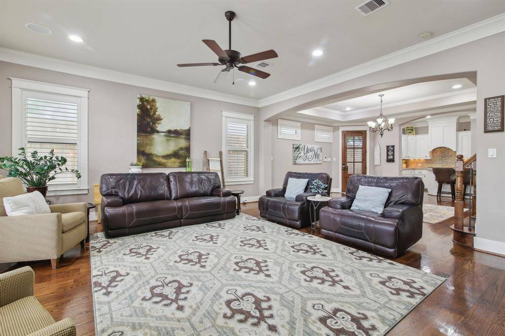 Large family room please take note to the plantation shutters in every room.