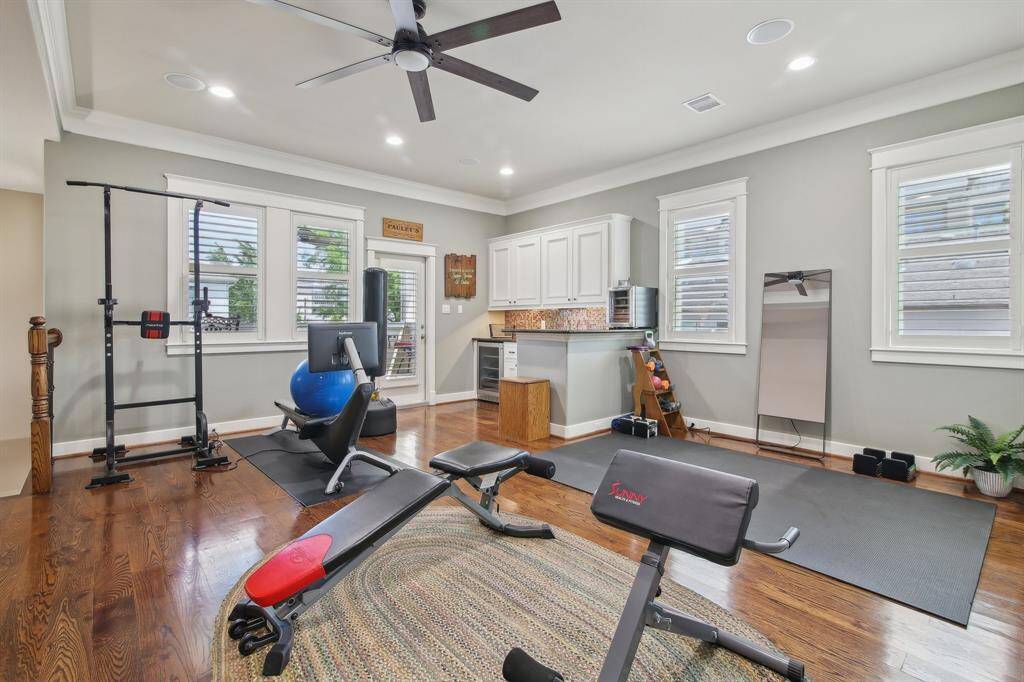 The third floor is a true showstopper, offering a versatile gameroom, full bathroom, private bedroom, and a stylish bar area—perfect for entertaining or relaxing.
