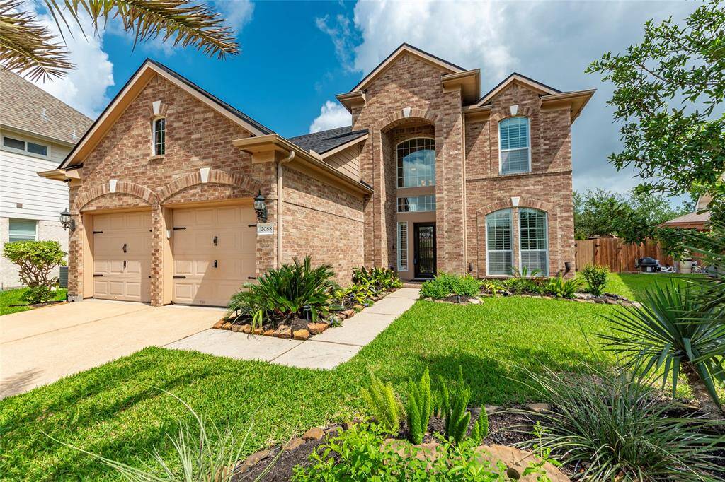 Beautiful 4 bedroom 2.5 bath, two story home with pool, palapa, and large patio located in the Twin Oaks subdivision.