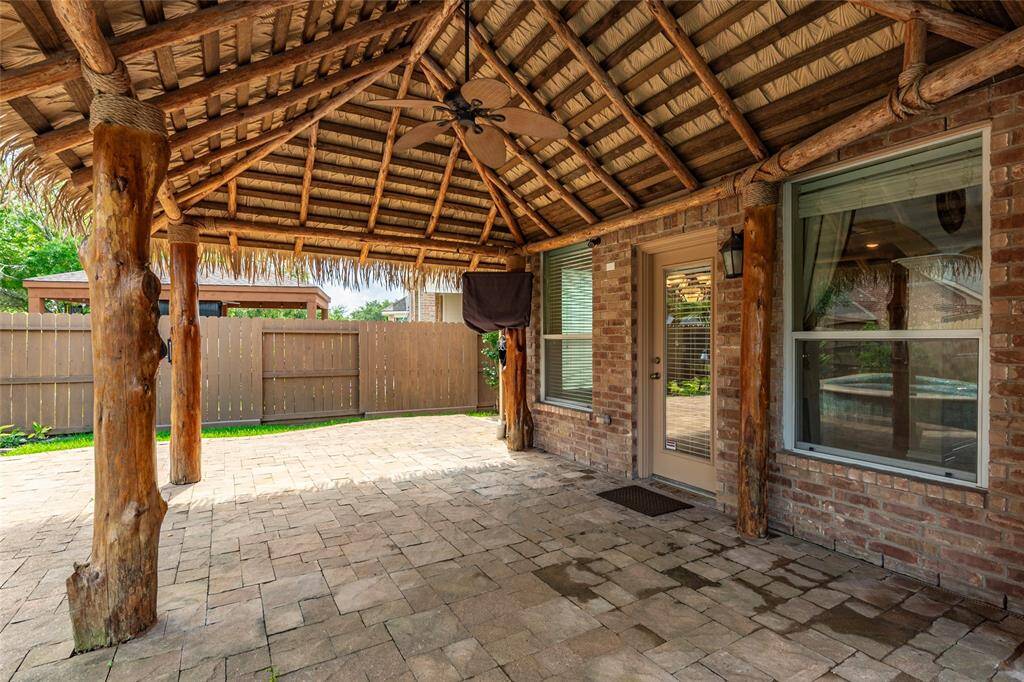 Direct access to the backyard from the main living areas. Another view from under the palapa.