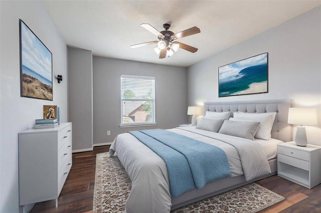 Virtually staged 3rd bedroom with wood floors, ceiling fan and 2" blinds.