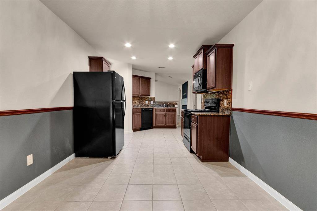 View of kitchen from dining area.