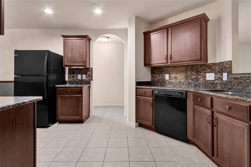 Black appliances in the kitchen.