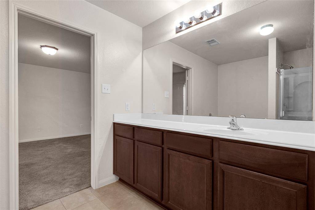 Plenty of counter space in the primary bathroom.