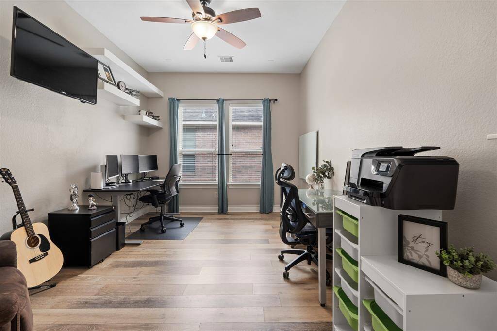 This study is tucked at end of hall next to half bath - can be 4th bedroom