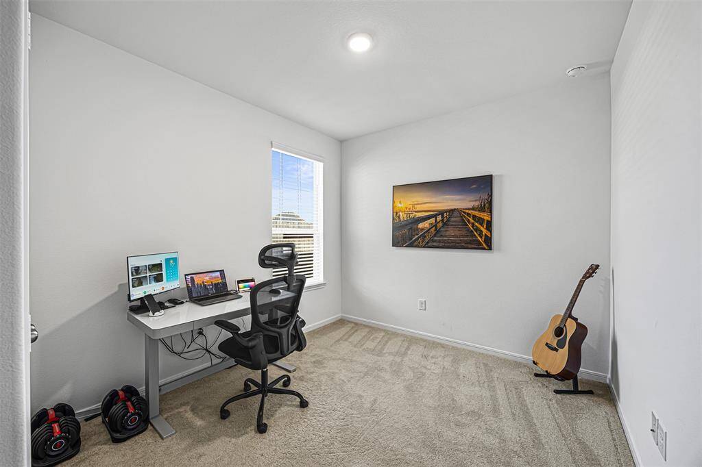 Enjoy this spacious bedroom that can be converted to an office space or room.