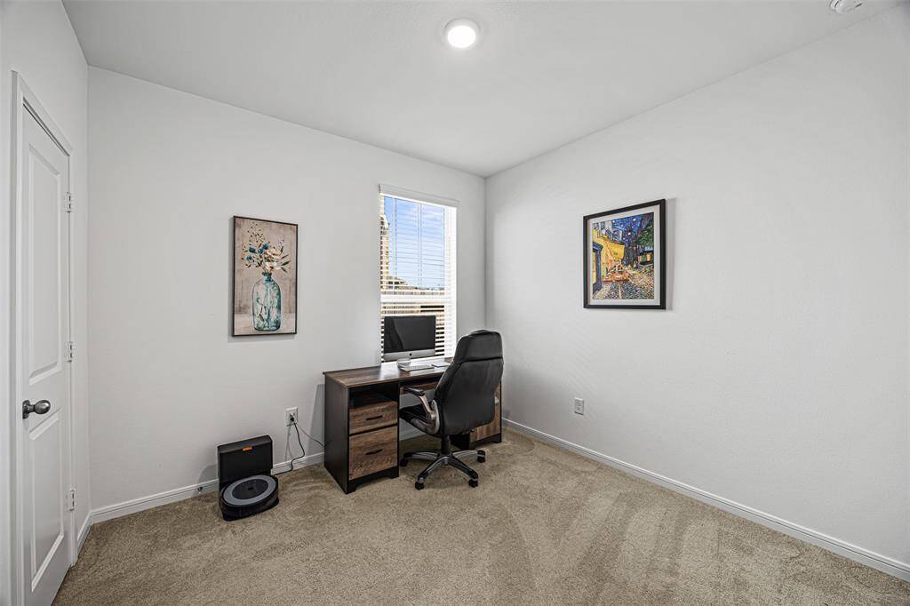Enjoy this spacious bedroom that can be converted to an office space or room.