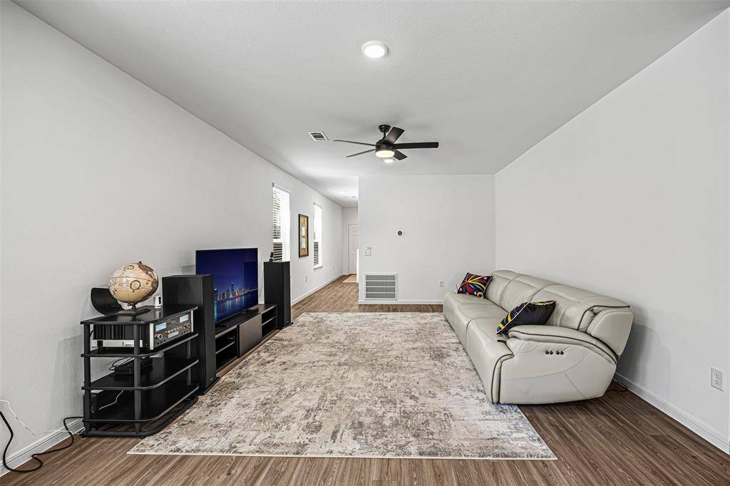 The living room provides wide, ample space.