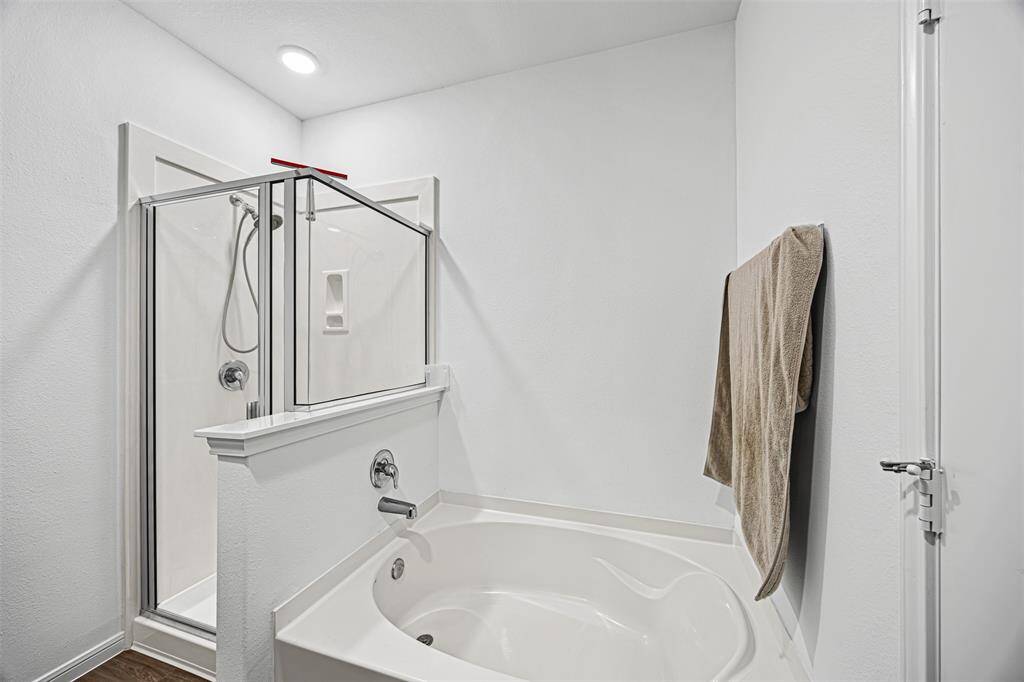 Main Bathroom Includes a Shower and Tub Combo