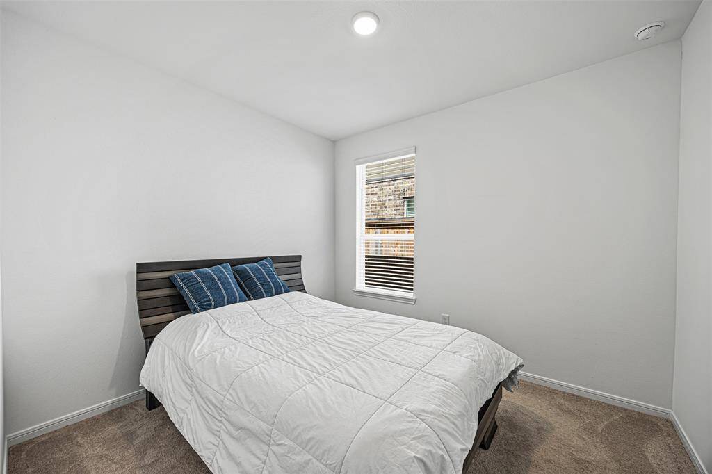Enjoy this spacious bedroom.
