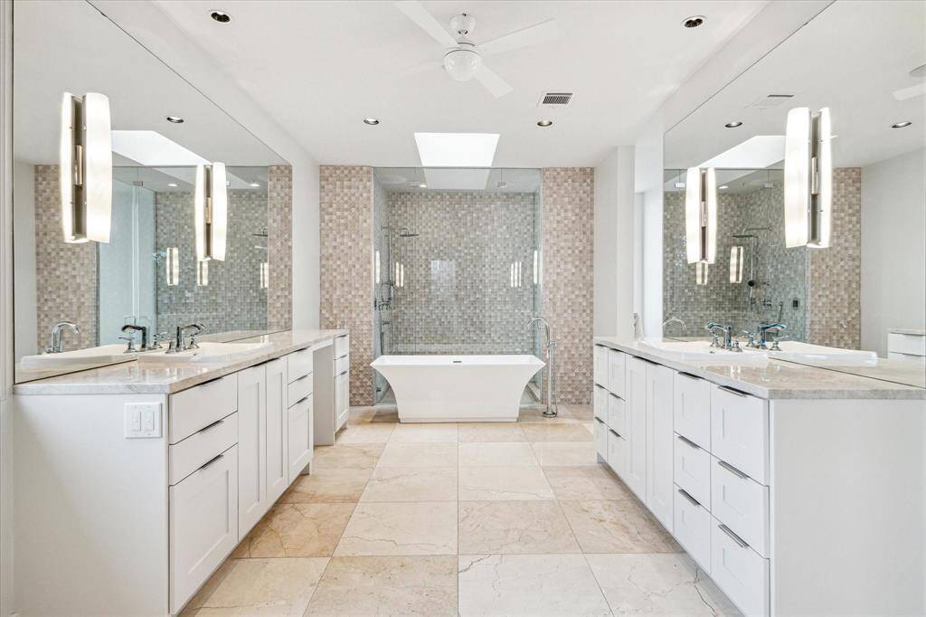 Free standing tub. Large shower with controller for wet steam.