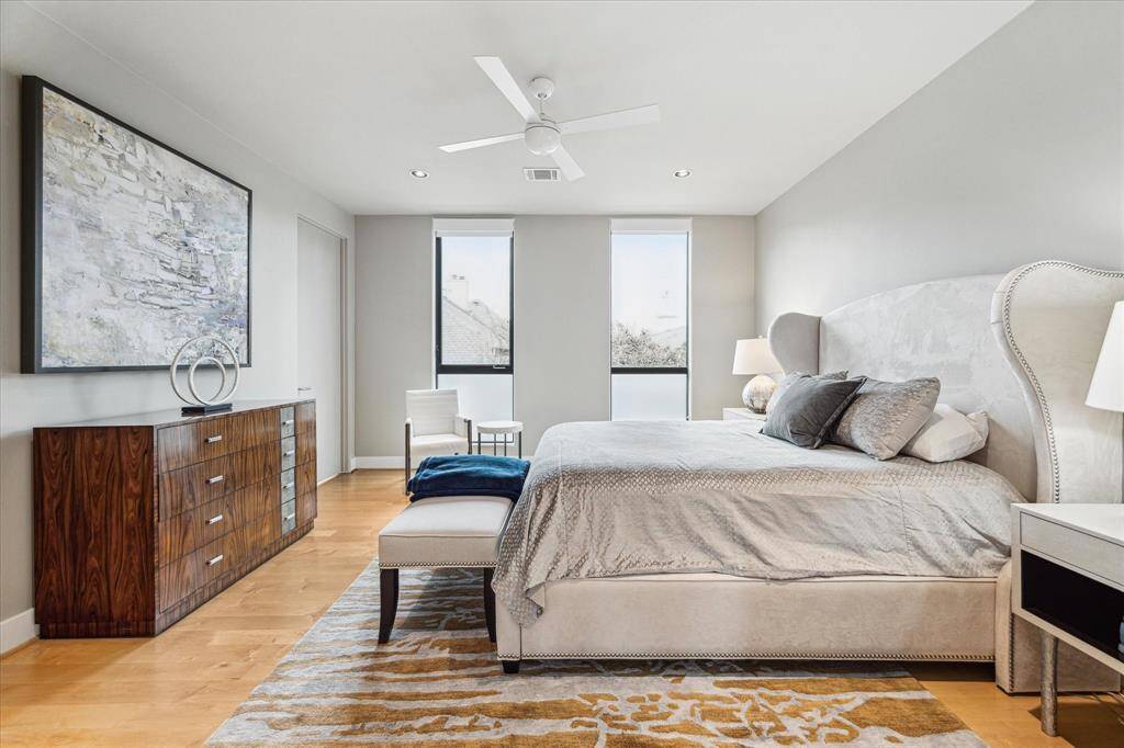 Second bedroom, located on the second floor. Hardwood flooring. Large walk-in closet. Ensuite bath.