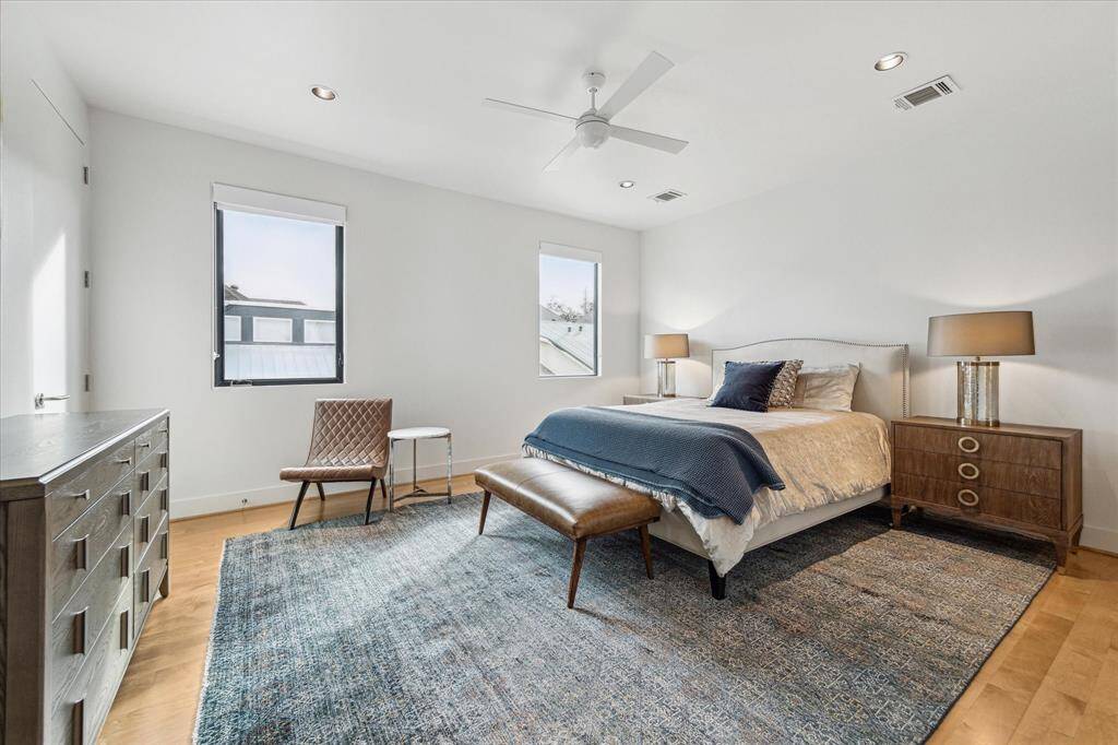 Third Bedroom, located on second floor. Hardwood flooring. Large walk-in customized closet. Ensuite bath