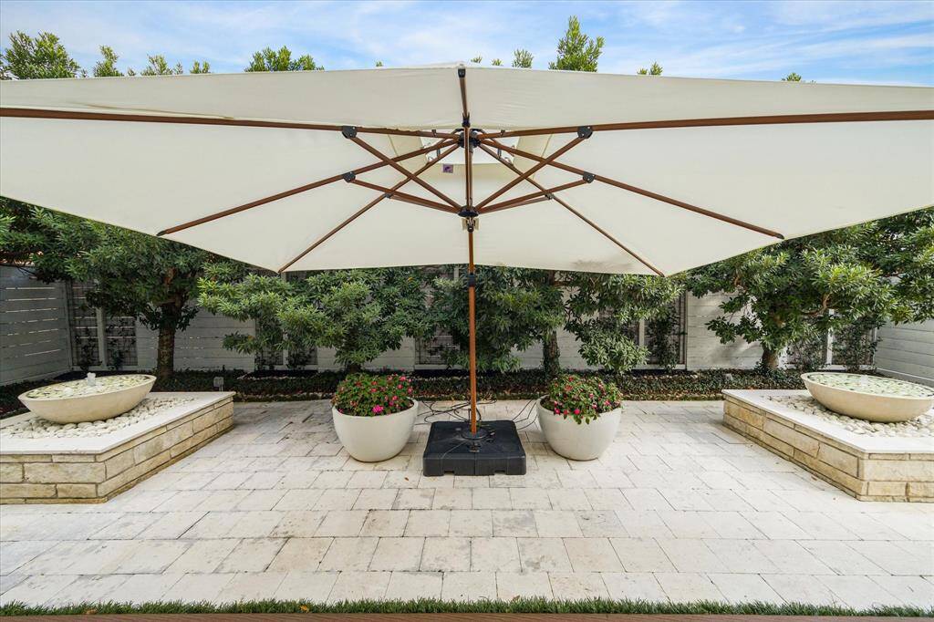The front patio is viewed from the both the formal living room and formal dining room.