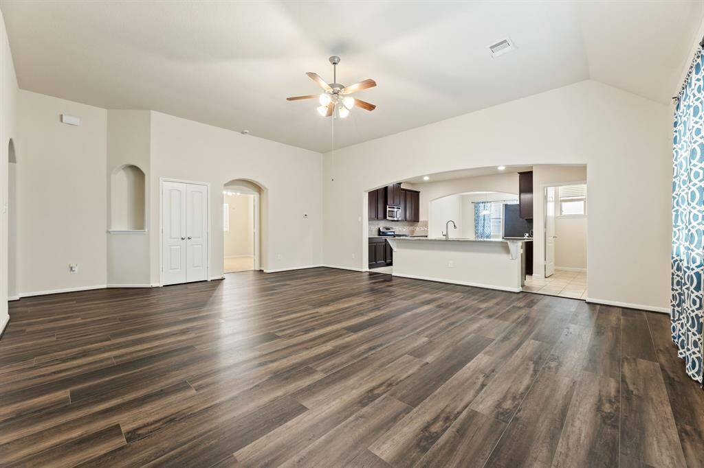 Living room is open to the kitchen.