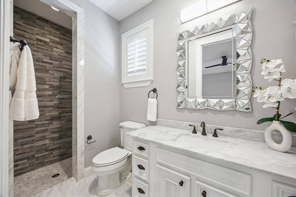 The utility room features granite countertops that make folding clothes a breeze and plenty of built-in cabinets to keep everything organized. A washer and dryer are thoughtfully included for your convenience.