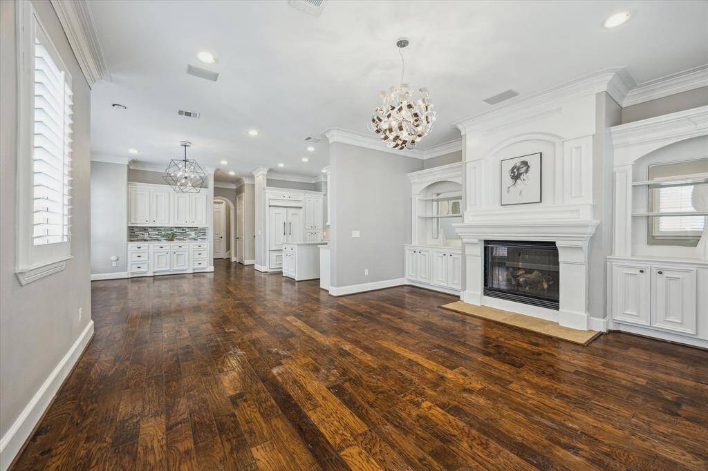 The second floor showcases a highly desirable open-concept floor plan, seamlessly connecting the kitchen, dining, and living areas for effortless entertaining and everyday living.