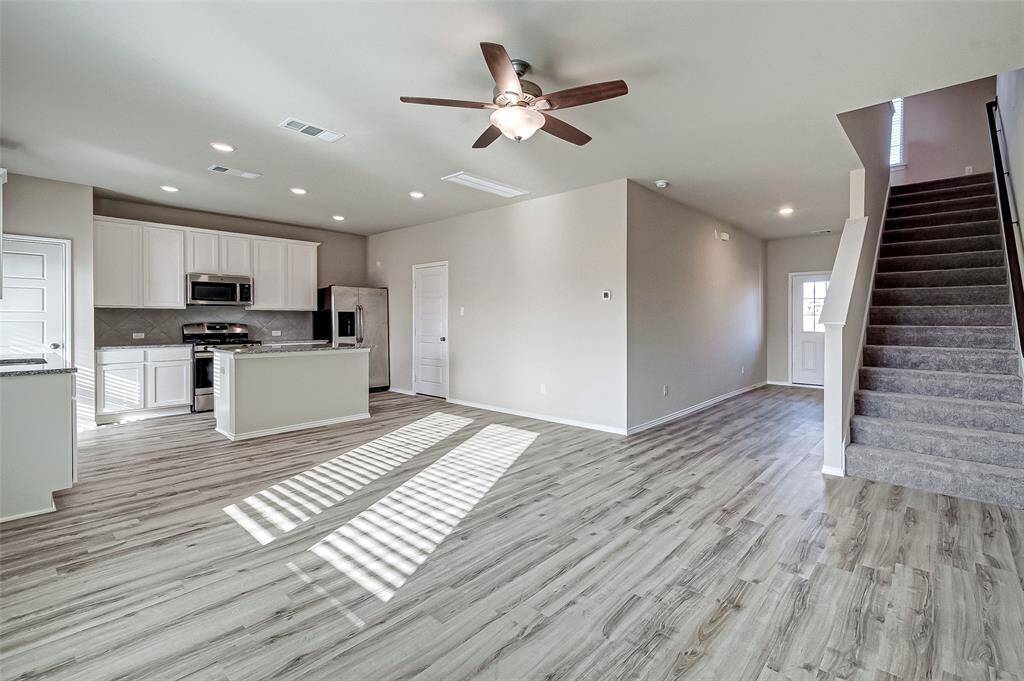 View from living into kitchen. Great space