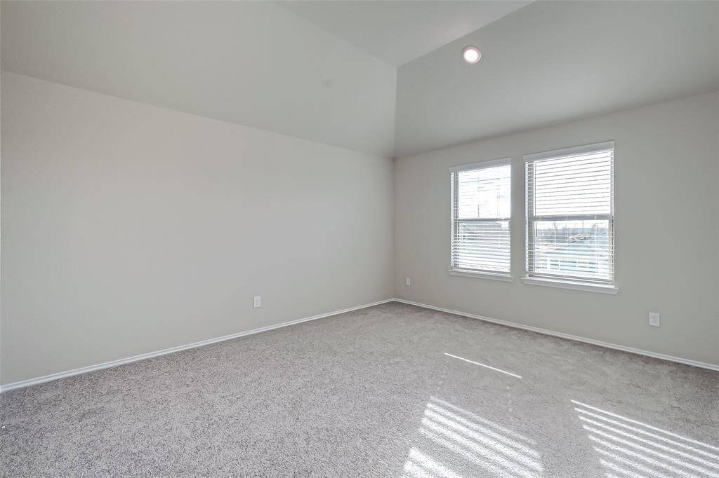 Alternate view of master bedroom. Enjoy high ceilings and beautiful recessed lighting
