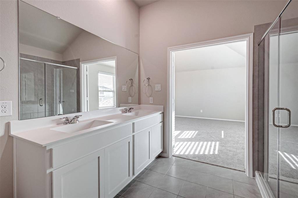 View of bathroom into bedroom.