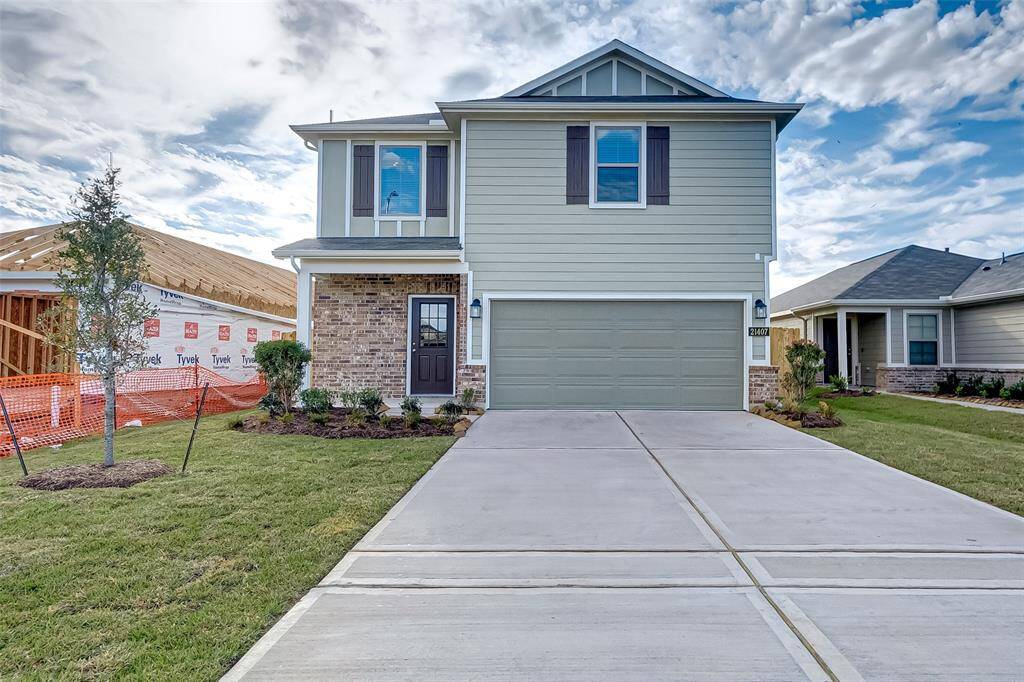 Welcome to this beautiful home. Enjoy a stunning facade as you drive up your driveway.