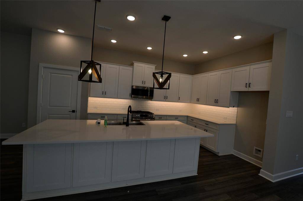 Island kitchen with pantry