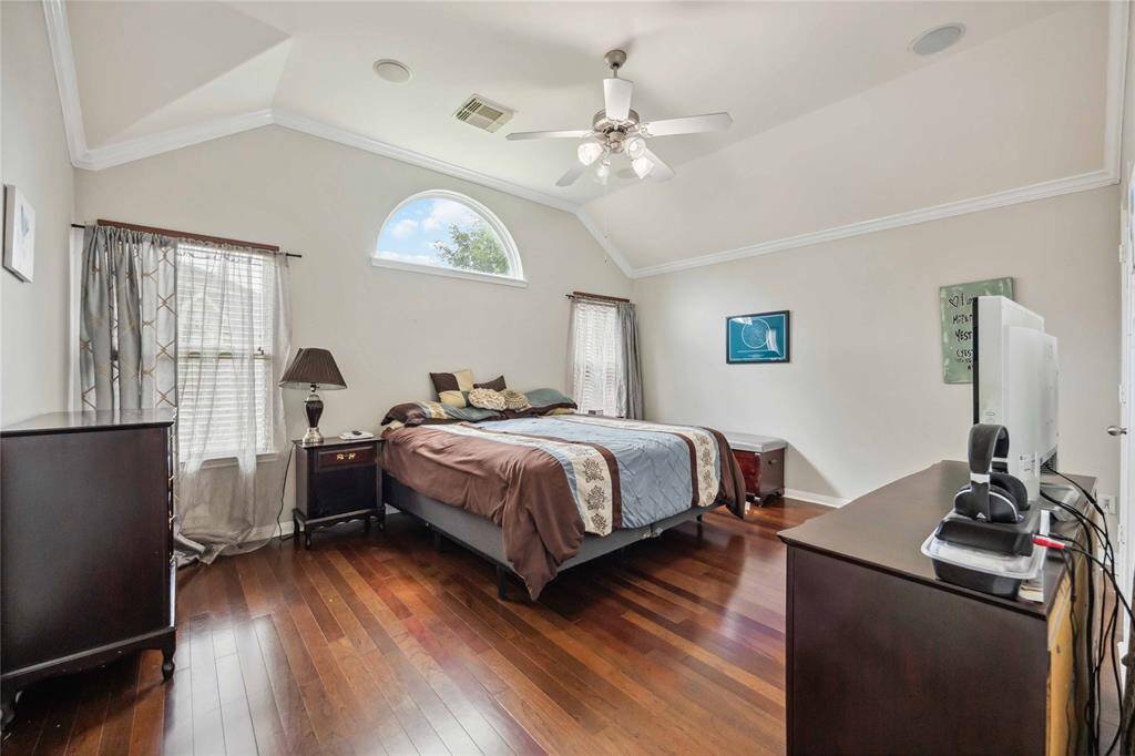 Spacious primary bedroom with walk-in closet and en-suite bathroom
