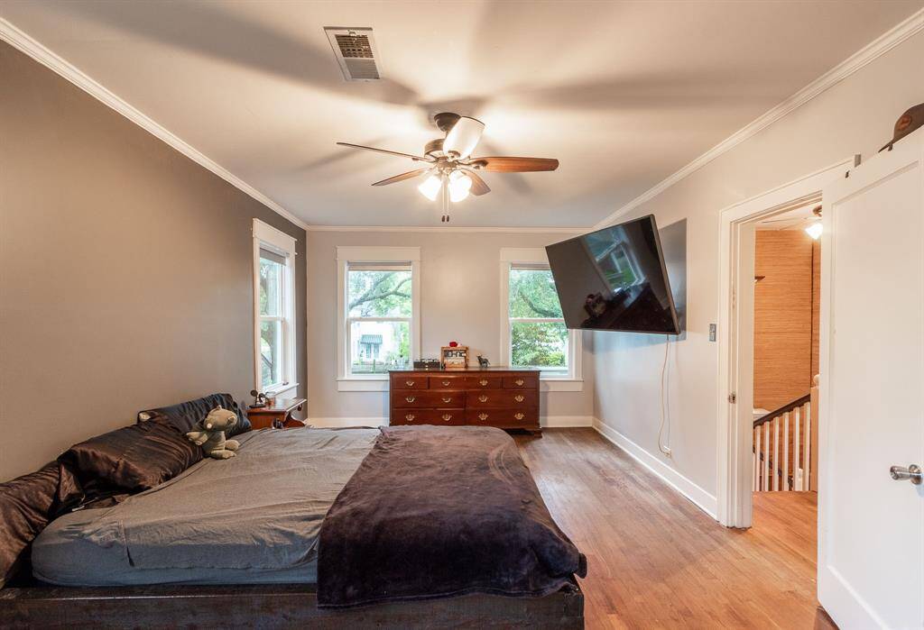The first of two large upstairs bedrooms.