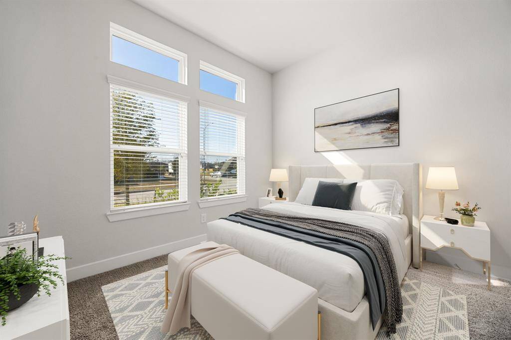 Another secondary bedroom provides a bright, comfortable space with generous closet storage—ideal for guests, kids, or a private home office. *Virtually Staged