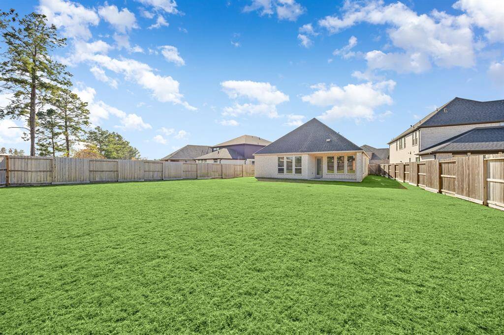 Step outside to a spacious, fully fenced backyard with ample room for outdoor fun, gardening, or simply relaxing under the Texas sky.