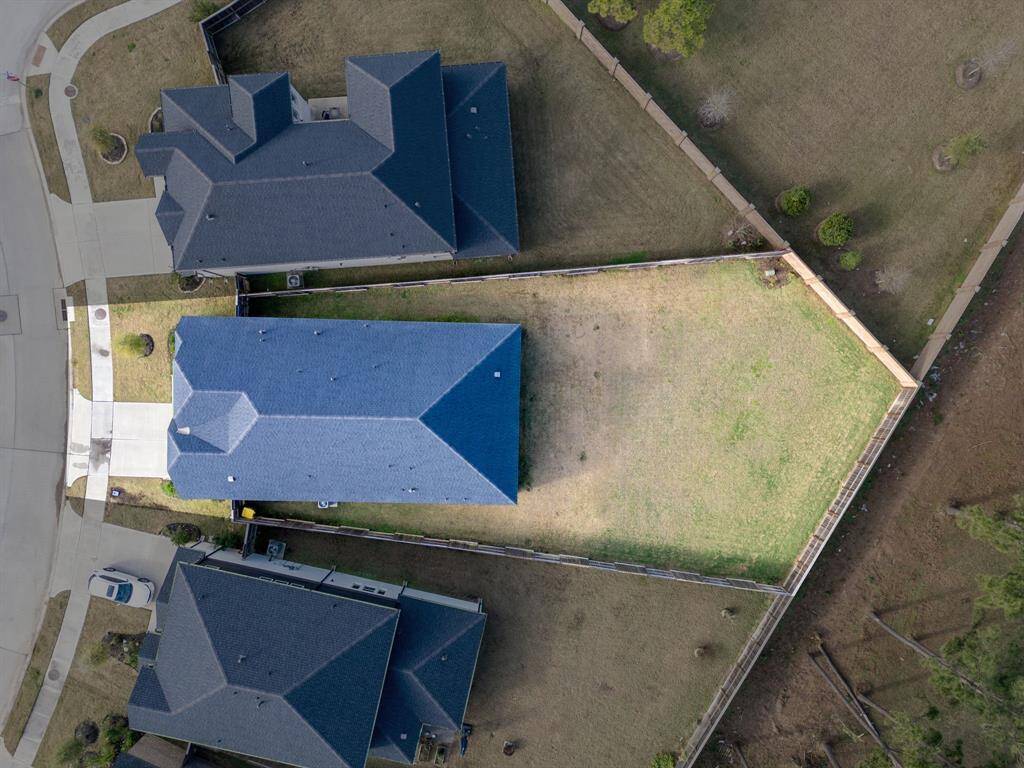 This home sits on a large lot with ample yard space in front and the back, lush landscaping and a well-maintained yard.  Plenty of space to accommodate guest parking and situated on a quiet street in the Raburn Reserve community.