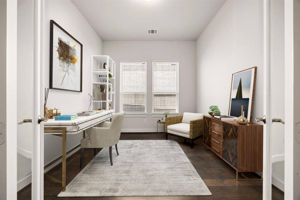 Nestled away quietly in the front of the home is the handsome and grand home office. Featuring high ceilings,  custom paint, wood-like flooring, recessed lighting and large windows. *Virtually Staged