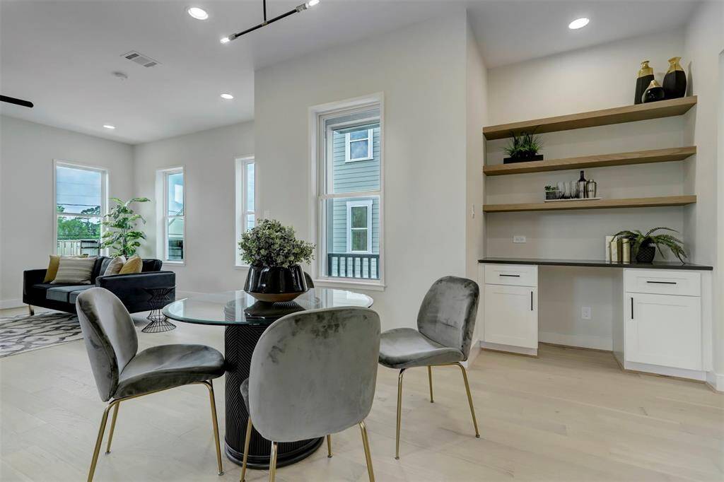 2nd Floor open dining space w/ modern design shelves
