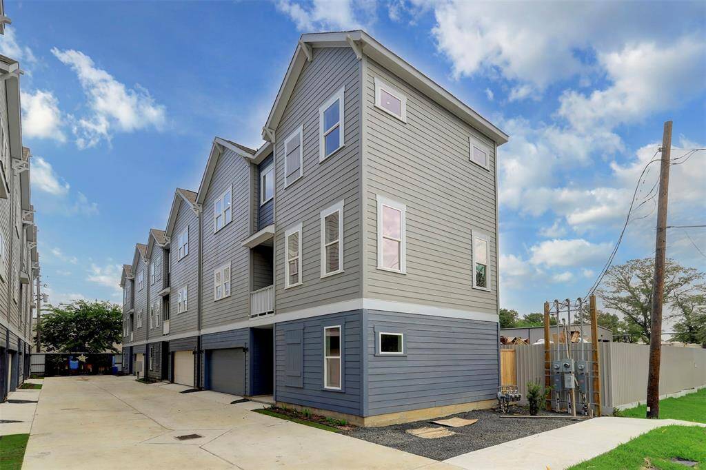 Exterior photo, corner house and additional designated 3rd parking spot