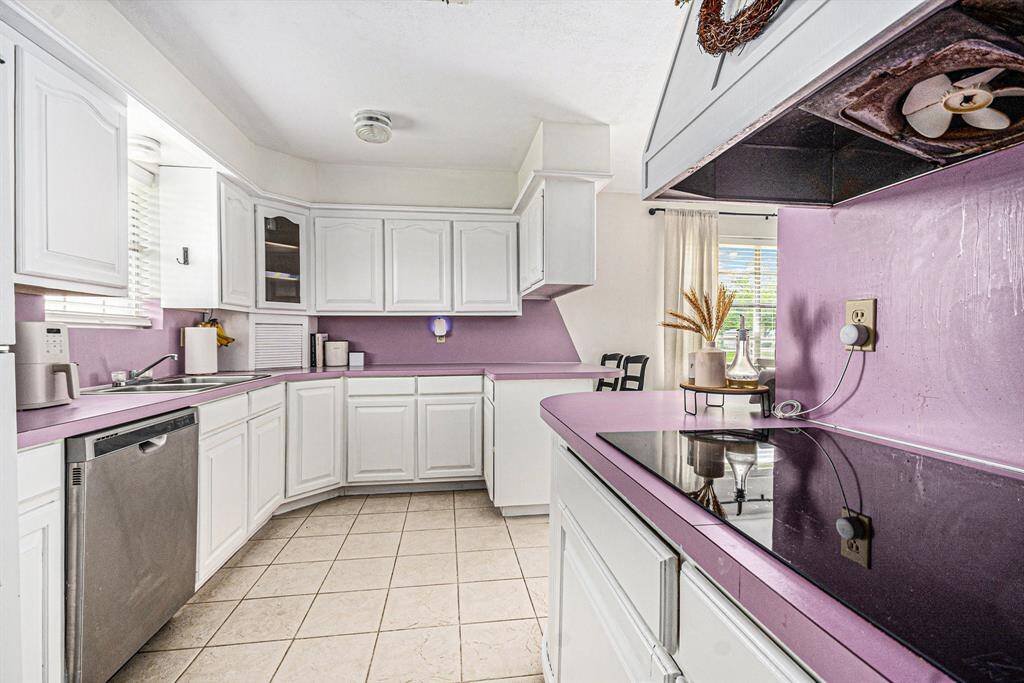 Updated appliances in this bright and cozy kitchen.
