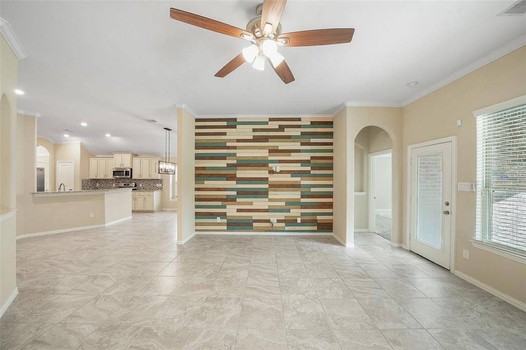 The primary suite extends through the door way to the right.