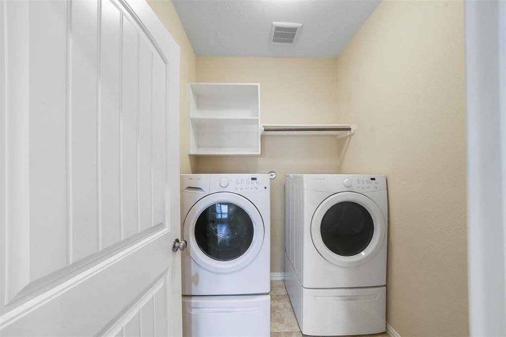 Washer/dryer and fridge convey with the property.