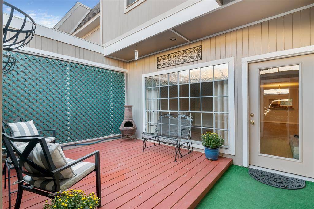 back patio with closet for storage and leading to outdoor parking