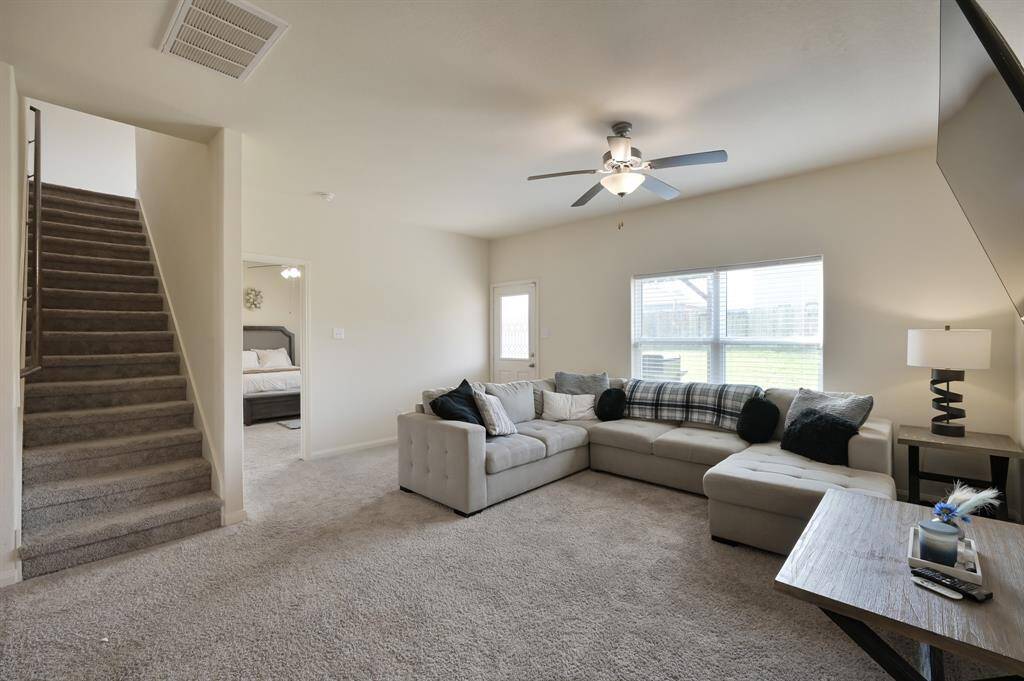 Livingroom with Stairway and entry to the 1st Floor Primary