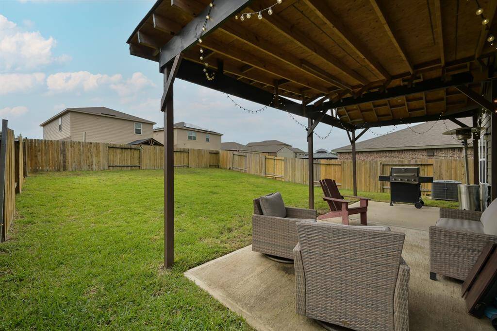 Back Yard view with extended covered back patio